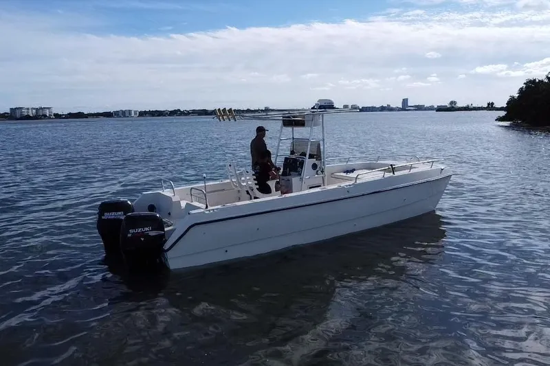 Slide: The Image of 1995 Sea Cat 255 Center Console on calm waters. - 20