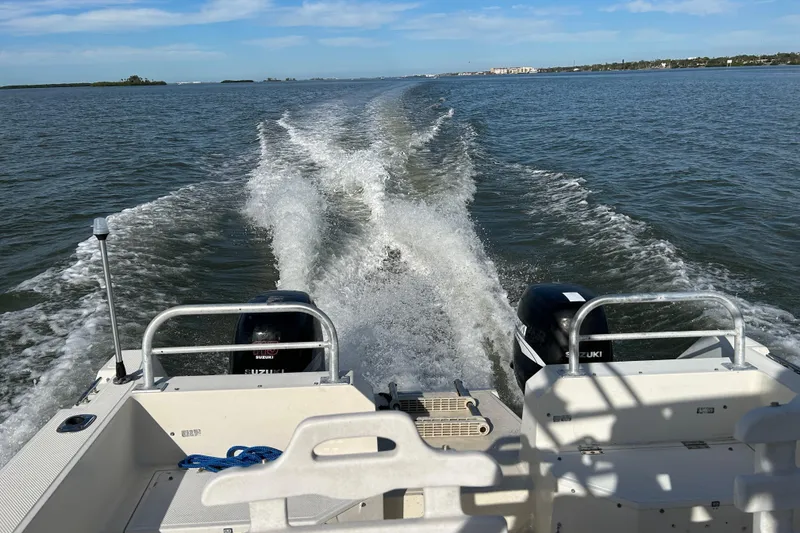 Slide: The Image of Sea Cat 255 center console boat on water, 1995 model. - 21