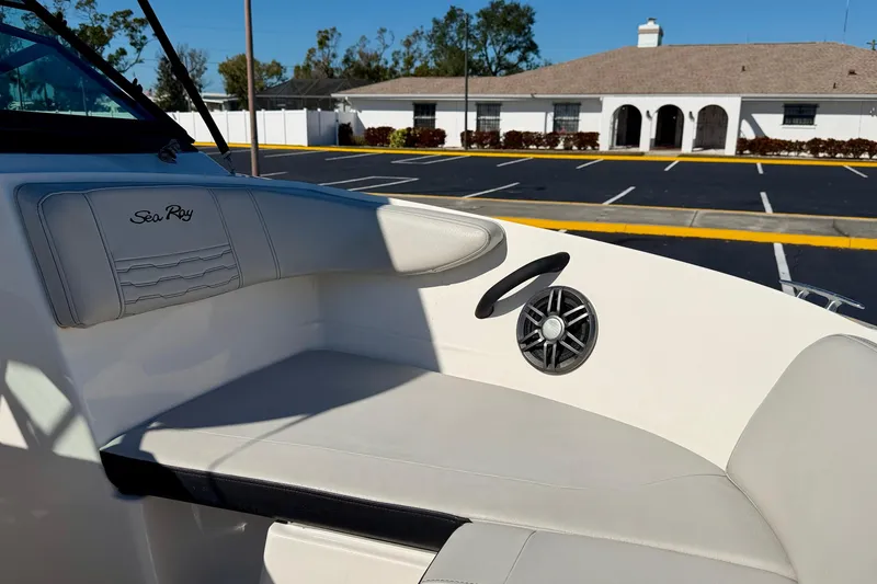 Slide: The Image of 2023 Sea Ray SPX 210 Outboard boat interior with seating and speaker. - 10