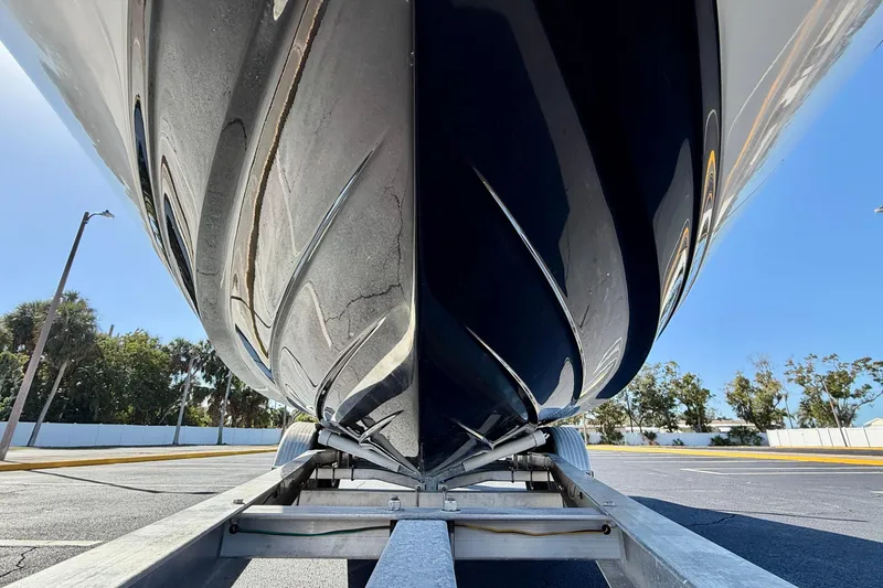 Slide: The Image of 2023 Sea Ray SPX 210 Outboard boat on trailer, viewed from below. - 28