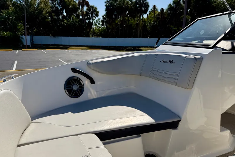 Slide: The Image of 2023 Sea Ray SPX 210 Outboard boat interior with seating and speaker. - 9