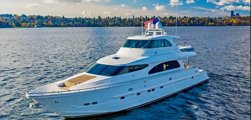 The Image of Horizon 82’ Cockpit Motoryacht 2006 on calm water, autumn landscape in background. - 0
