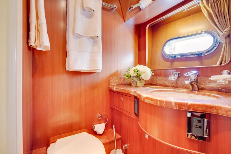 Slide: The Image of Luxurious bathroom in a 2006 Horizon 82’ Cockpit Motoryacht. - 27