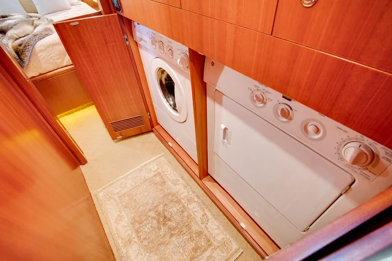 Slide: The Image of Laundry area on Horizon 82’ Cockpit Motoryacht, 2006 model. - 28