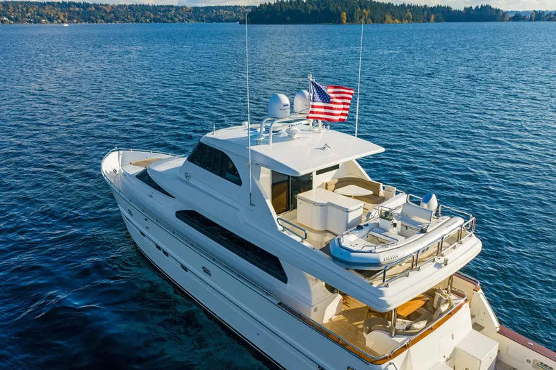 Slide: The Image of 2006 Horizon 82’ Cockpit Motoryacht on open water. - 3