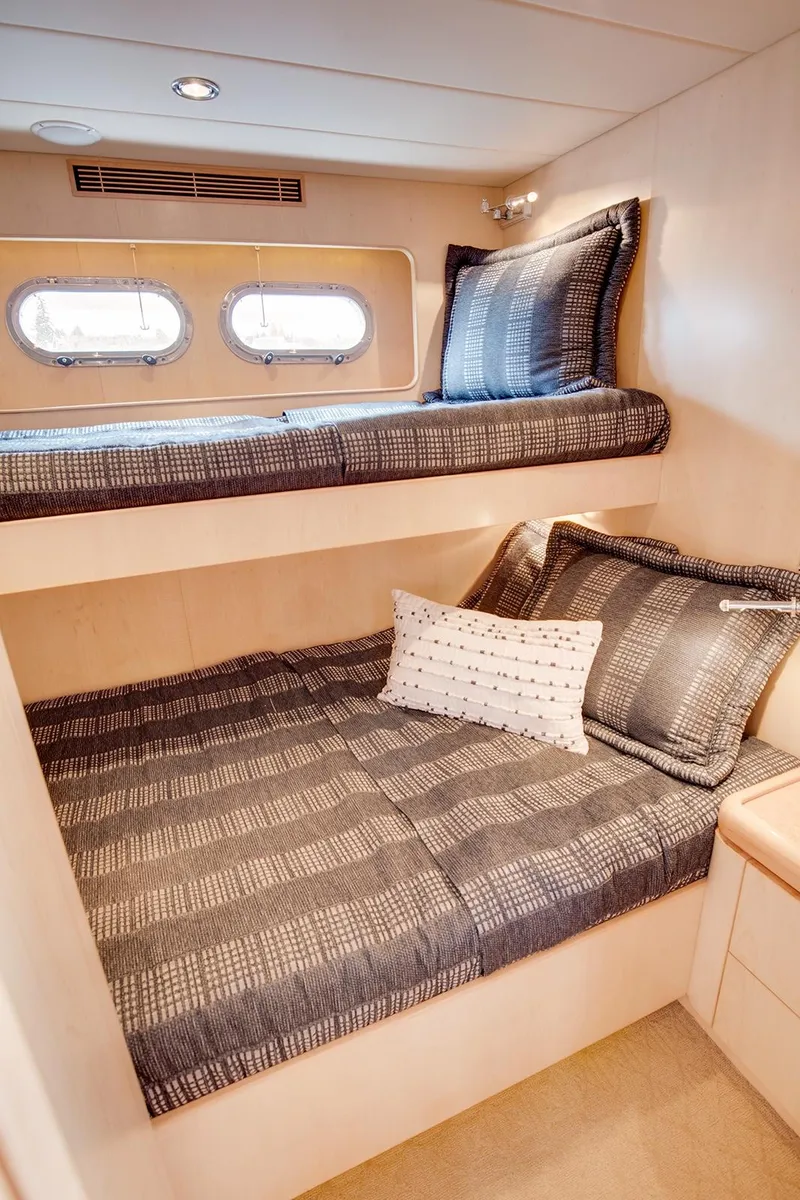 Slide: The Image of Interior of 2006 Horizon 82’ Cockpit Motoryacht with bunk beds. - 30