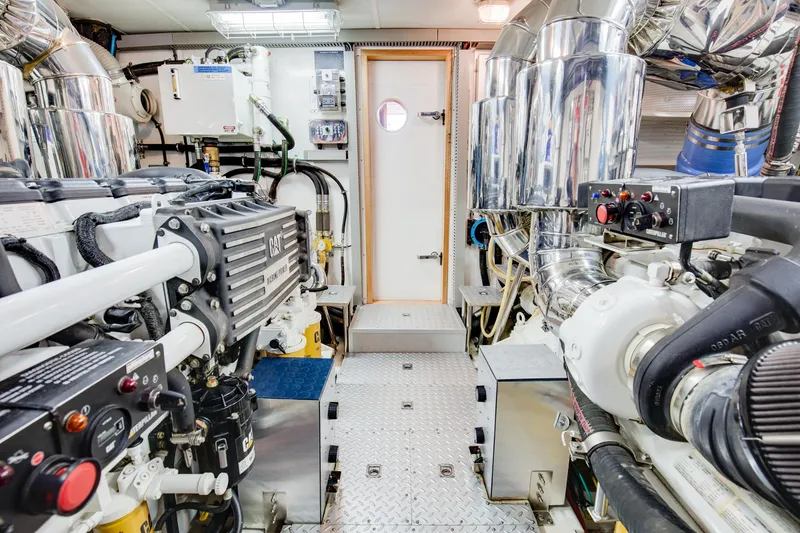 Slide: The Image of Engine room of 2006 Horizon 82’ Cockpit Motoryacht. - 34