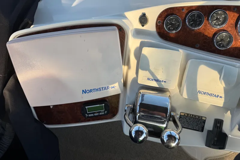 Slide: The Image of Control panel of a 2007 Meridian 459 Motoryacht with Northstar navigation equipment. - 15