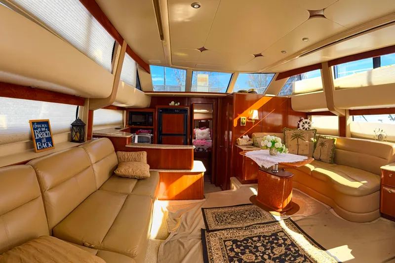 Slide: The Image of Luxurious interior of a 2007 Meridian 459 Motoryacht with elegant seating and decor. - 22