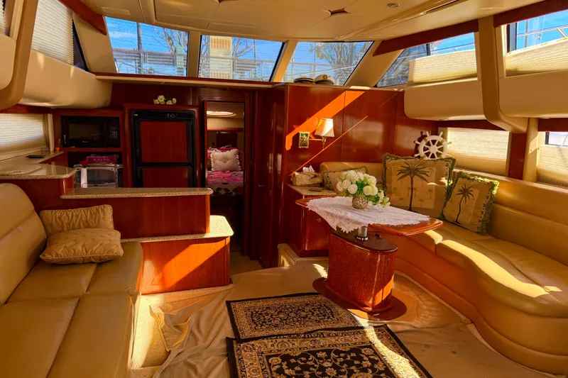 Slide: The Image of Luxurious interior of a 2007 Meridian 459 Motoryacht with elegant furnishings and decor. - 25