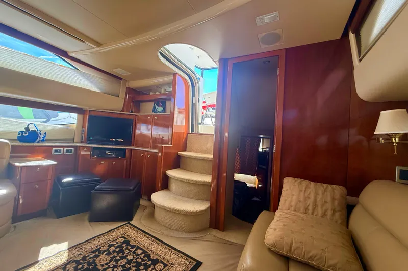 Slide: The Image of Luxurious interior of 2007 Meridian 459 Motoryacht with elegant wood finishes and cozy seating. - 28