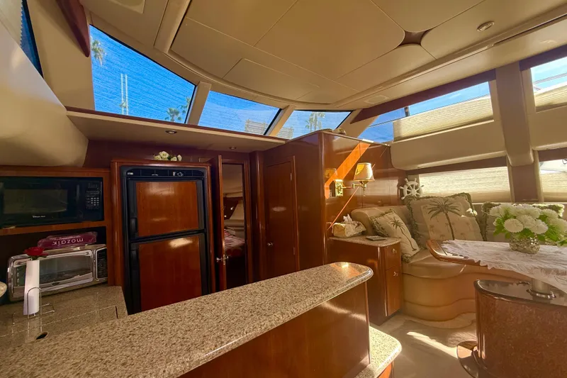 Slide: The Image of Luxurious 2007 Meridian 459 Motoryacht interior with elegant wood finishes and plush seating. - 29