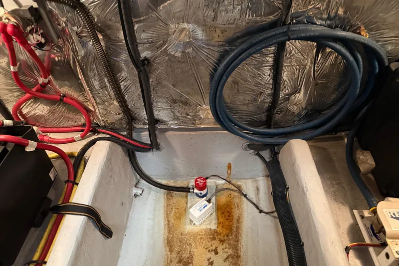 Slide: The Image of Engine room of a 2007 Meridian 459 Motoryacht with wiring and insulation. - 35