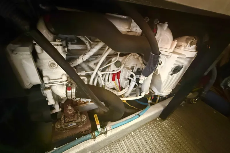 Slide: The Image of Engine compartment of a 2007 Meridian 459 Motoryacht, showcasing mechanical components. - 44