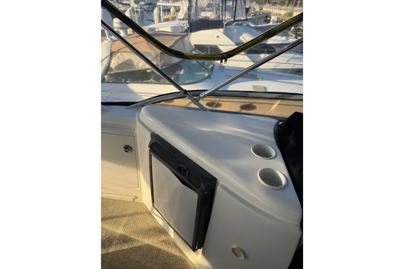 Slide: The Image of 2007 Meridian 459 Motoryacht interior with cup holders and mini fridge. - 51