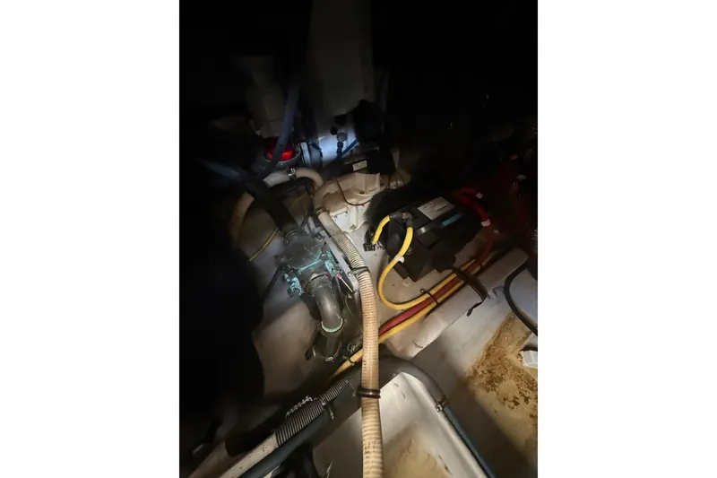 Slide: The Image of Engine room of 2007 Meridian 459 Motoryacht with visible wiring and components. - 57