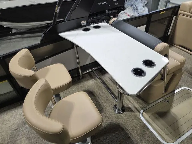 Slide: The Image of Interior of 2026 Barletta Lusso 25UE with table and seating. - 17