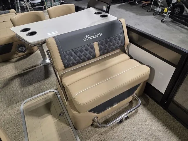 Slide: The Image of Interior of 2026 Barletta Lusso 25UE with luxurious seating. - 18