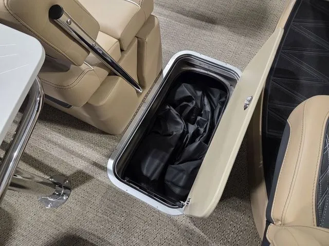 Slide: The Image of Interior of 2026 Barletta Lusso 25UE with storage compartment. - 27