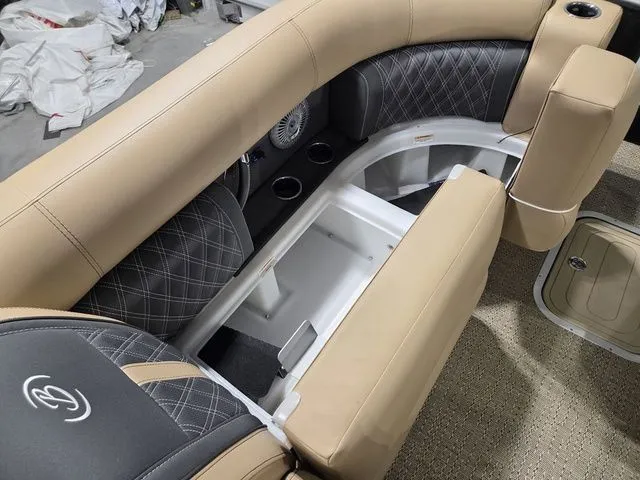 Slide: The Image of Interior of 2026 Barletta Lusso 25UE with luxurious seating. - 32