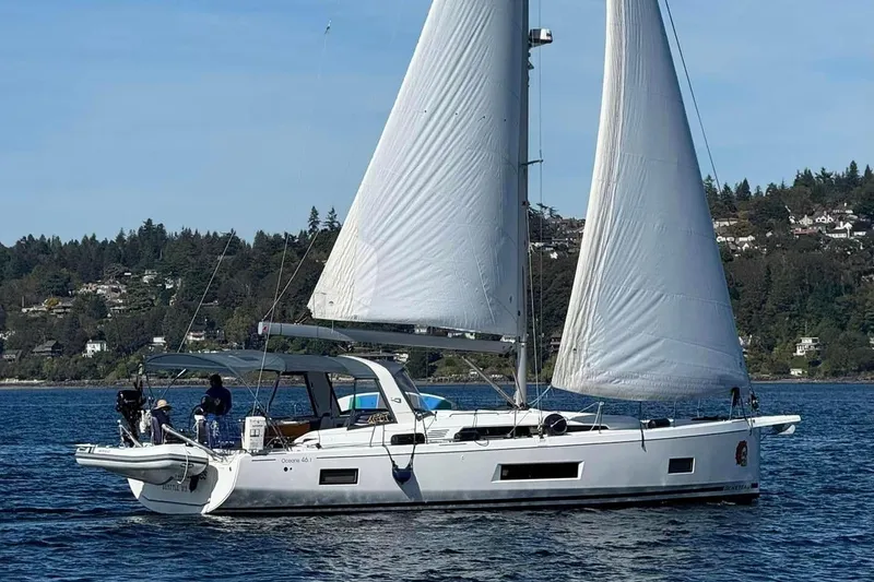 The Image of 2019 Beneteau Oceanis 46.1 sailboat on calm waters. - 0