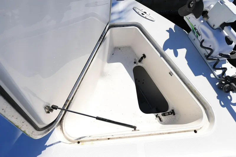 Slide: The Image of Open storage compartment on a 2005 Jupiter 38 FS boat. - 30