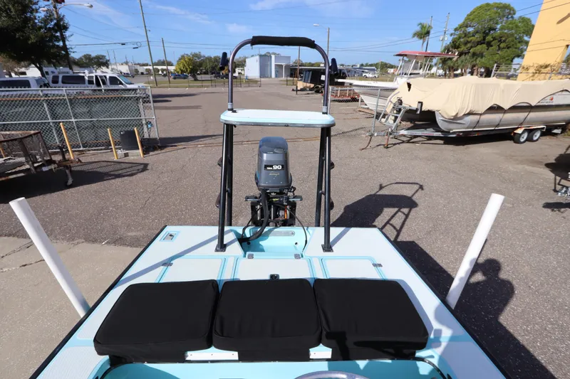 Slide: The Image of 1996 Silver King Signature 16 boat with outboard motor in a marina setting. - 10