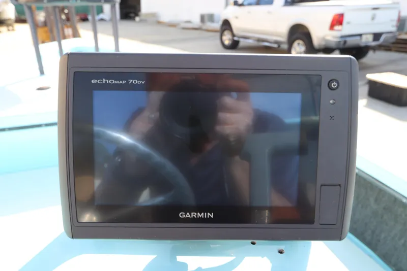 Slide: The Image of Garmin echoMAP 70dv on 1996 Silver King Signature 16 boat dashboard. - 17