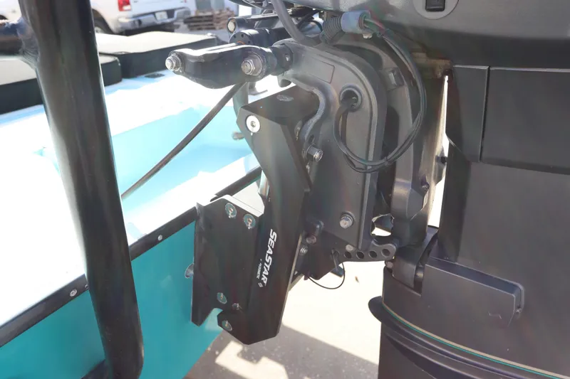 Slide: The Image of 1996 Silver King Signature 16 boat motor with SeaStar hydraulic steering system. - 8