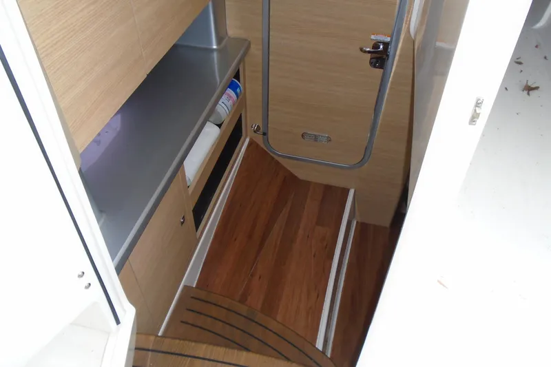 Slide: The Image of Chrome throttle control panel on 2013 Chaparral 327 SSX boat. - 15