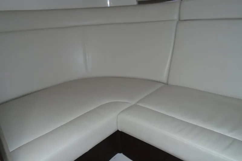 Slide: The Image of 2013 Chaparral 327 SSX boat bathroom with toilet and sink. - 19