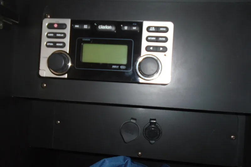 Slide: The Image of 2013 Chaparral 327 SSX interior seating with white leather upholstery. - 21