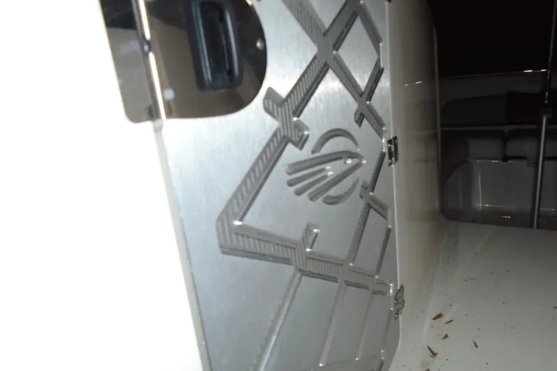 Slide: The Image of 2013 Chaparral 327 SSX boat interior with white and red seating. - 25