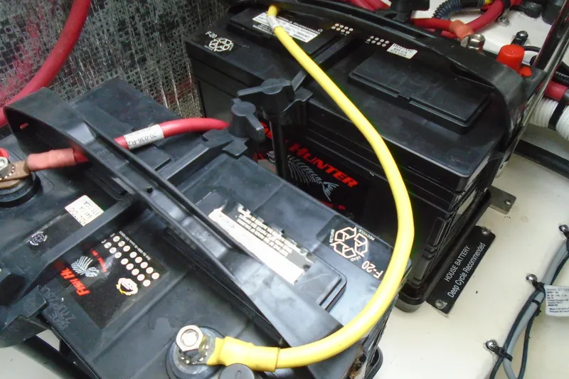 Slide: The Image of Engine compartment of a 2013 Chaparral 327 SSX boat, showcasing mechanical components. - 34