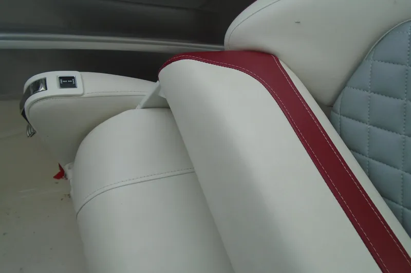 Slide: The Image of Batteries in 2013 Chaparral 327 SSX boat engine compartment with wiring connections. - 35