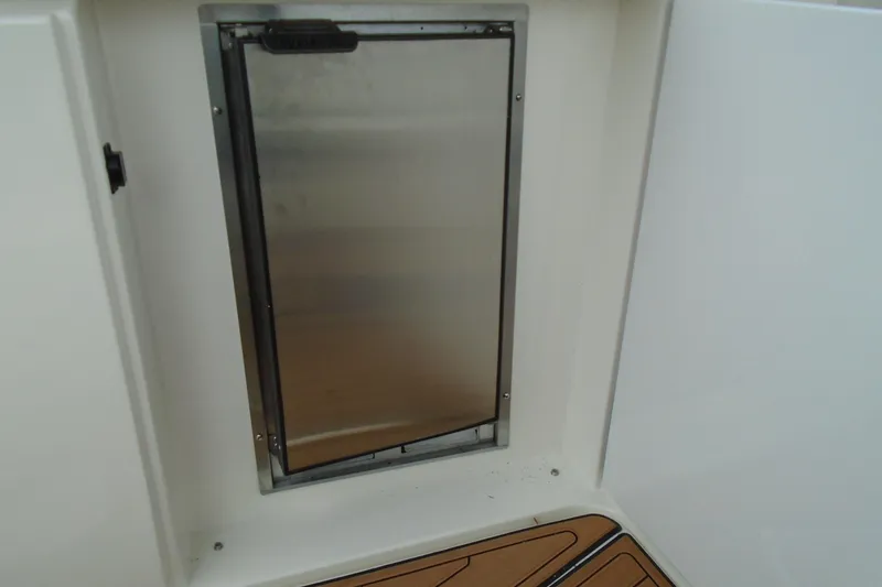 Slide: The Image of Stainless steel door on 2003 Cruisers Yachts 3470 Express boat interior. - 16