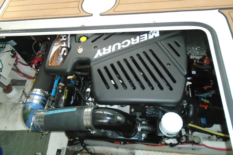 Slide: The Image of Engine compartment of 2003 Cruisers Yachts 3470 Express with Mercury MerCruiser 8.1S motor. - 45