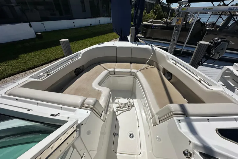 Slide: The Image of 2018 Boston Whaler 320 Vantage boat with spacious seating area and modern design. - 14