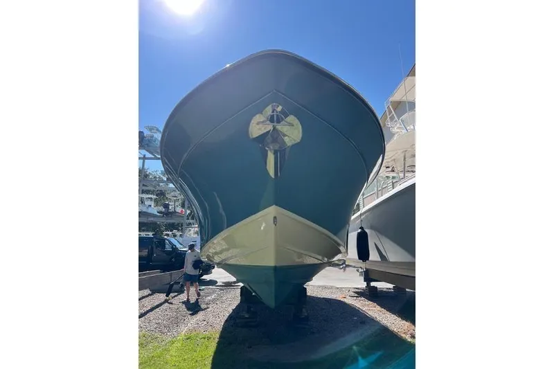 Slide: The Image of 2020 Grady-White Freedom 307 boat with twin Yamaha 300 engines, named "Daddy's Broke III." - 10