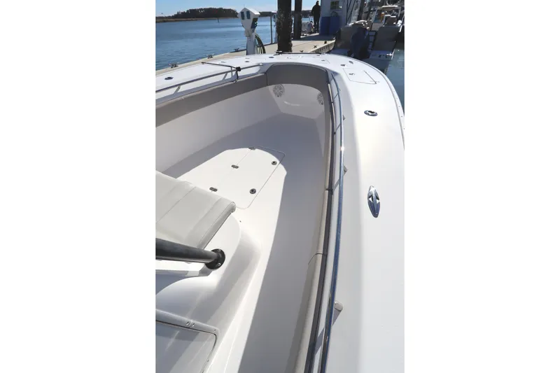 Slide: The Image of 2021 Cape Horn 31 T boat interior with sleek white design and spacious seating. - 15