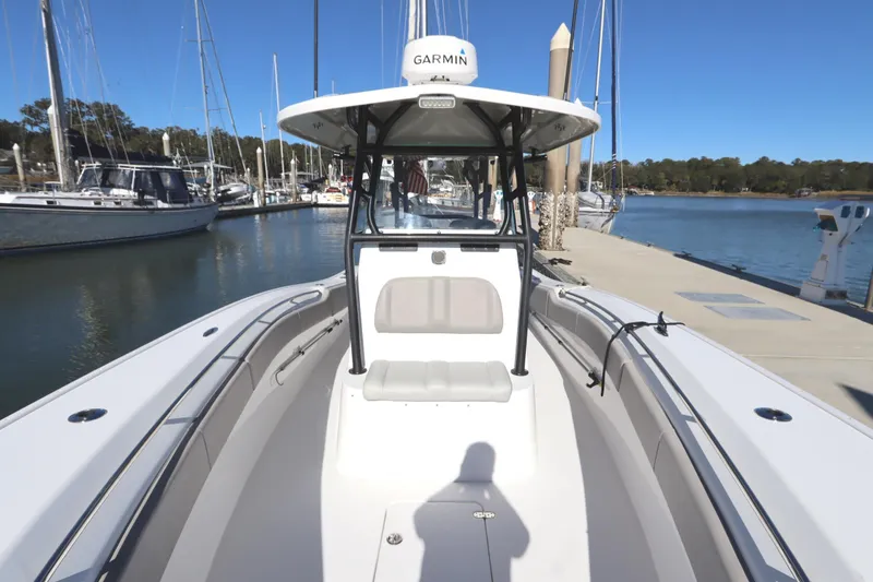Slide: The Image of 2021 Cape Horn 31 T boat docked at marina, clear sky, calm waters. - 18