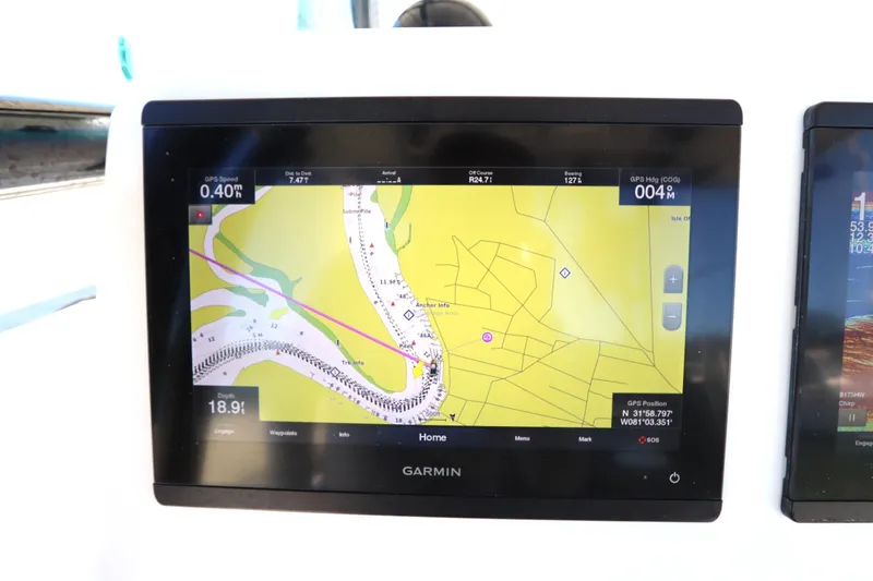 Slide: The Image of Garmin GPS display on 2021 Cape Horn 31 T boat, showing navigation map. - 25