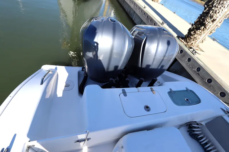 Slide: The Image of 2021 Cape Horn 31 T boat with dual outboard engines docked at marina. - 28