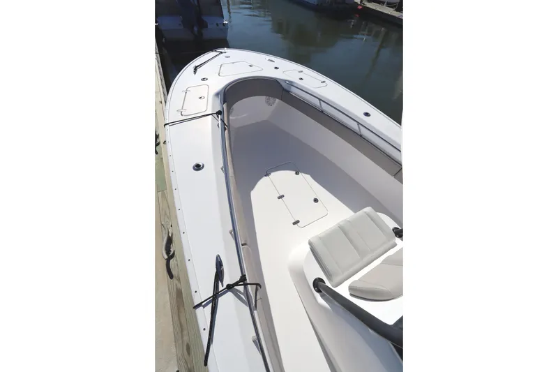 Slide: The Image of 2021 Cape Horn 31 T boat interior with seating, docked at marina. - 13