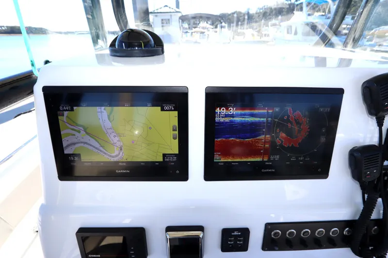 Slide: The Image of Dashboard of 2021 Cape Horn 31 T boat with Garmin navigation displays. - 22