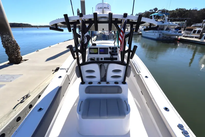 Slide: The Image of 2021 Cape Horn 31 T boat at dock, featuring modern console and rod holders. - 30