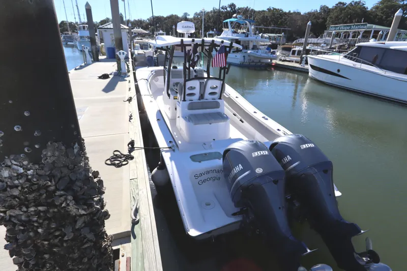 Slide: The Image of 2021 Cape Horn 31 T boat docked with twin Yamaha engines at a marina. - 4