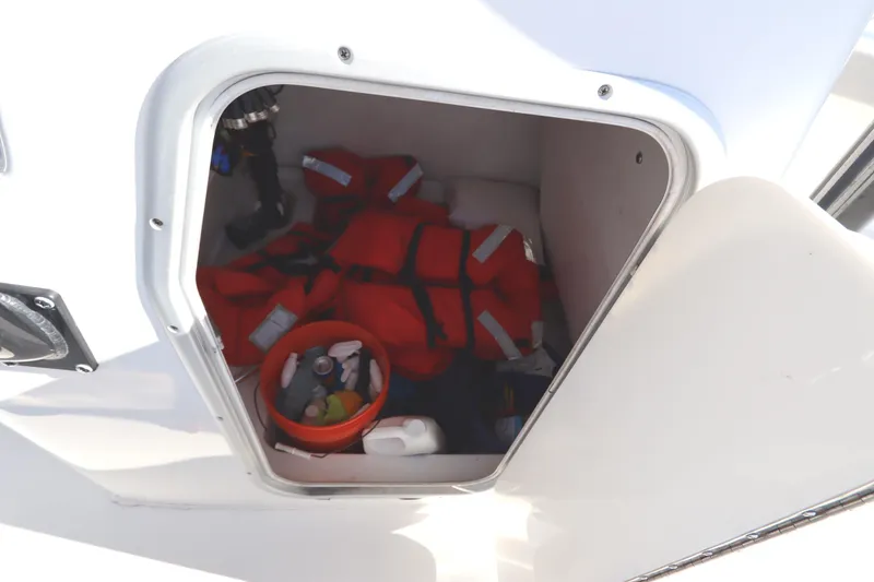 Slide: The Image of Storage compartment on 2021 Cape Horn 31 T boat with life jackets and supplies. - 50