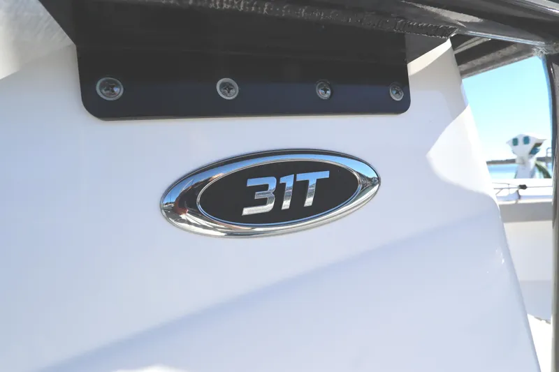 Slide: The Image of Cape Horn 31 T boat emblem, 2021 model, close-up view. - 51