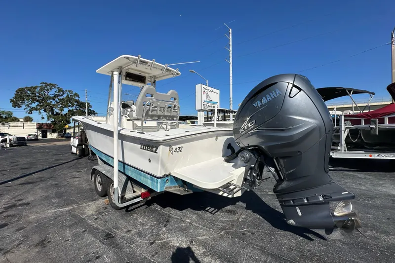 Slide: The Image of 2005 Topaz 24 Silverhawk boat with Yamaha outboard motor on trailer. - 1